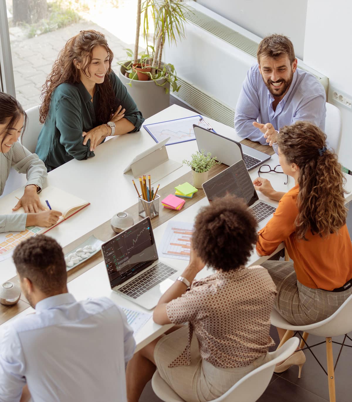 a group of people sitting at a table