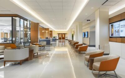 a modern, well-lit hospital waiting room with engaging educational materials displayed on sleek digital screens, highlighting important health information for patients.