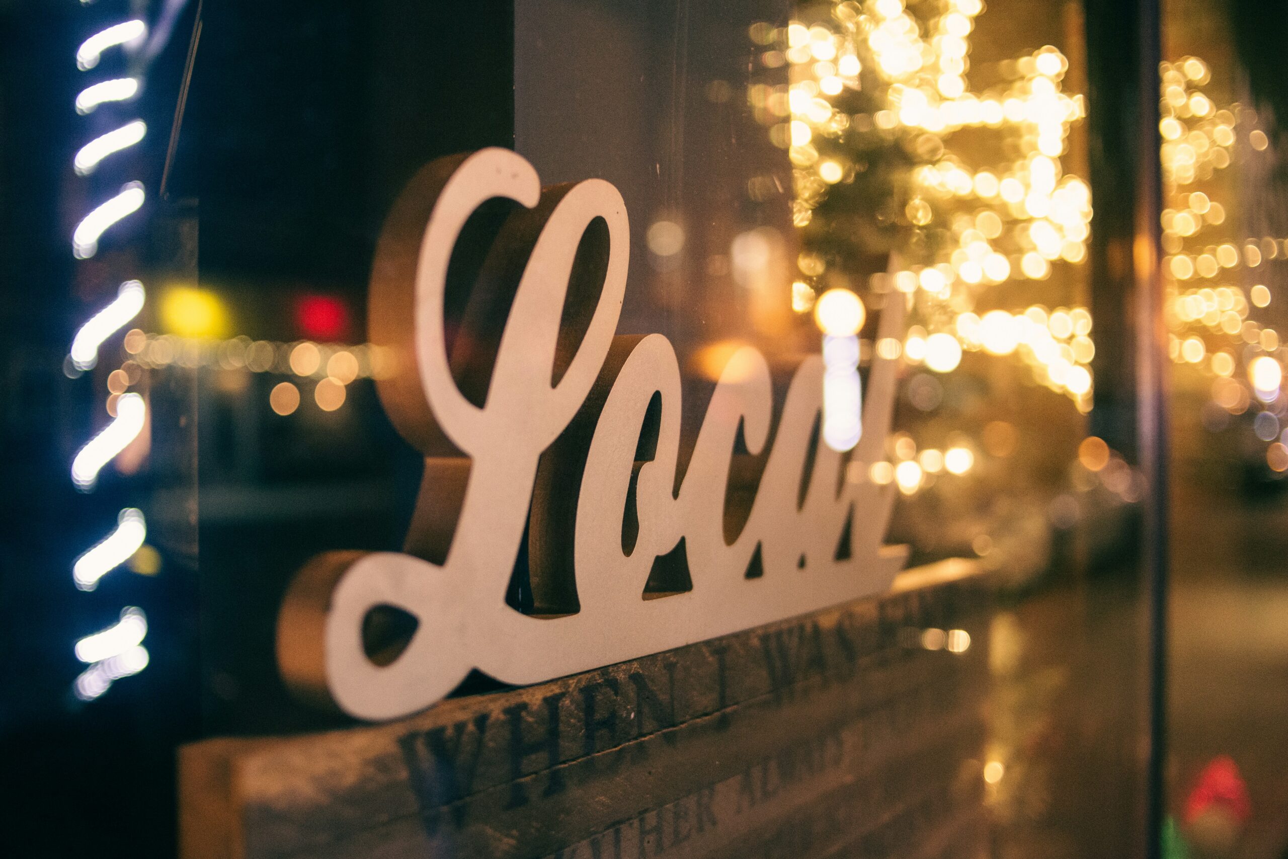 Local sign with decorative lights reflecting the importance of local SEO for small businesses.